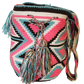 "Colorful handmade Wayuu crochet crossbody bag, showcasing traditional vibrant patterns and a boho flair, perfect for versati