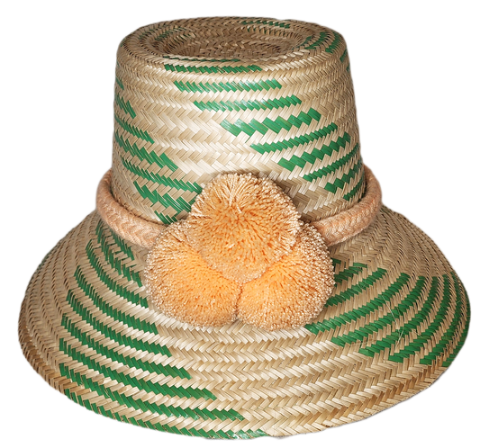 "Colorful handmade Wayuu hat by Wuitusu, adorned with significant cultural pompoms, crafted from Iraca palm fibers."