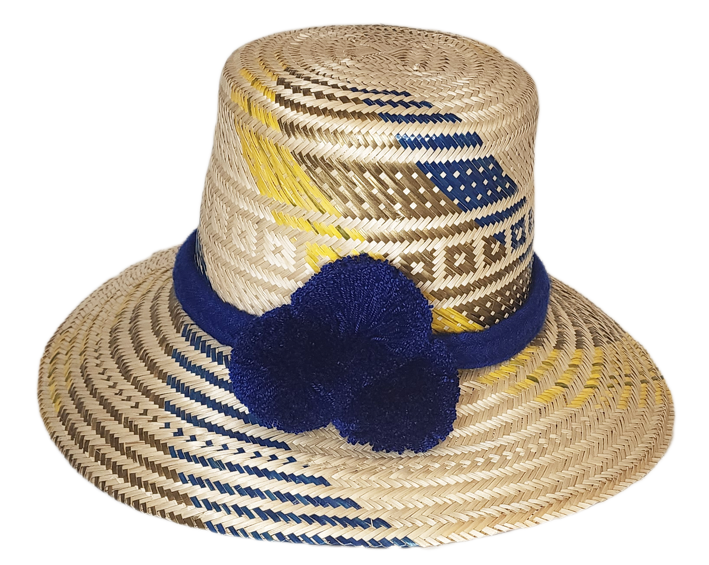"Colorful handmade Wayuu hat by Wuitusu artisans, adorned with culturally significant pompoms, adjustable for all sizes."