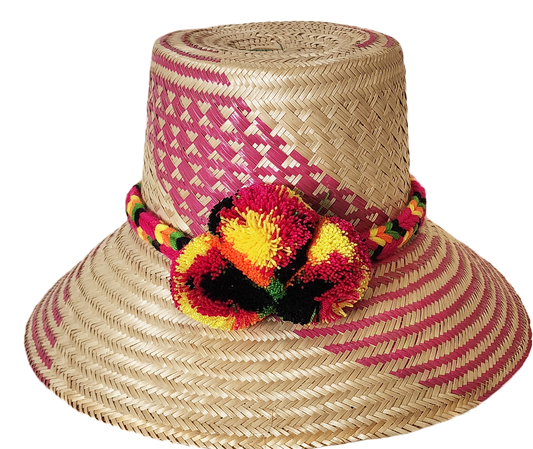 "Colorful Handmade Wayuu Hat by Wuitusu artisans, crafted from Iraca palm fibers, featuring adjustable styling and cultural p