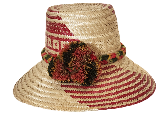 "Colorful Handmade Wayuu Hat by Wuitusu, crafted from Iraca palm fibers, featuring adjustable fit and decorative pompoms."