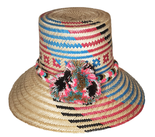"Colorful handmade Wayuu hat crafted from Iraca palm, adorned with cultural pompoms, adjustable for a perfect fit."
