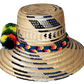 "Colorful handmade Wayuu hat crafted from Iraca palm, adorned with cultural pompoms for style and symbolism."