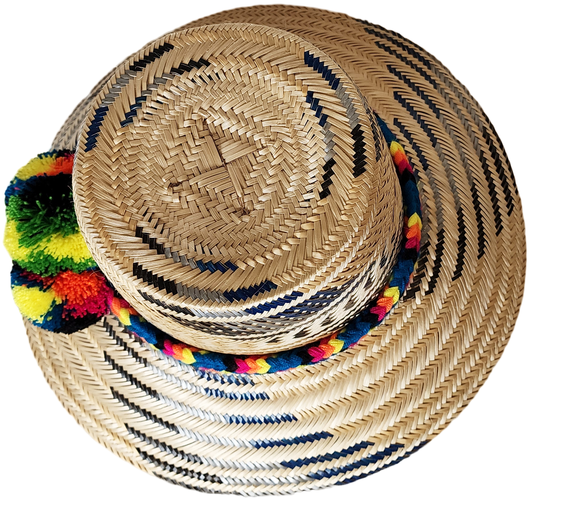 "Colorful handmade Wayuu hat crafted from Iraca palm, adorned with cultural pompoms for style and symbolism."
