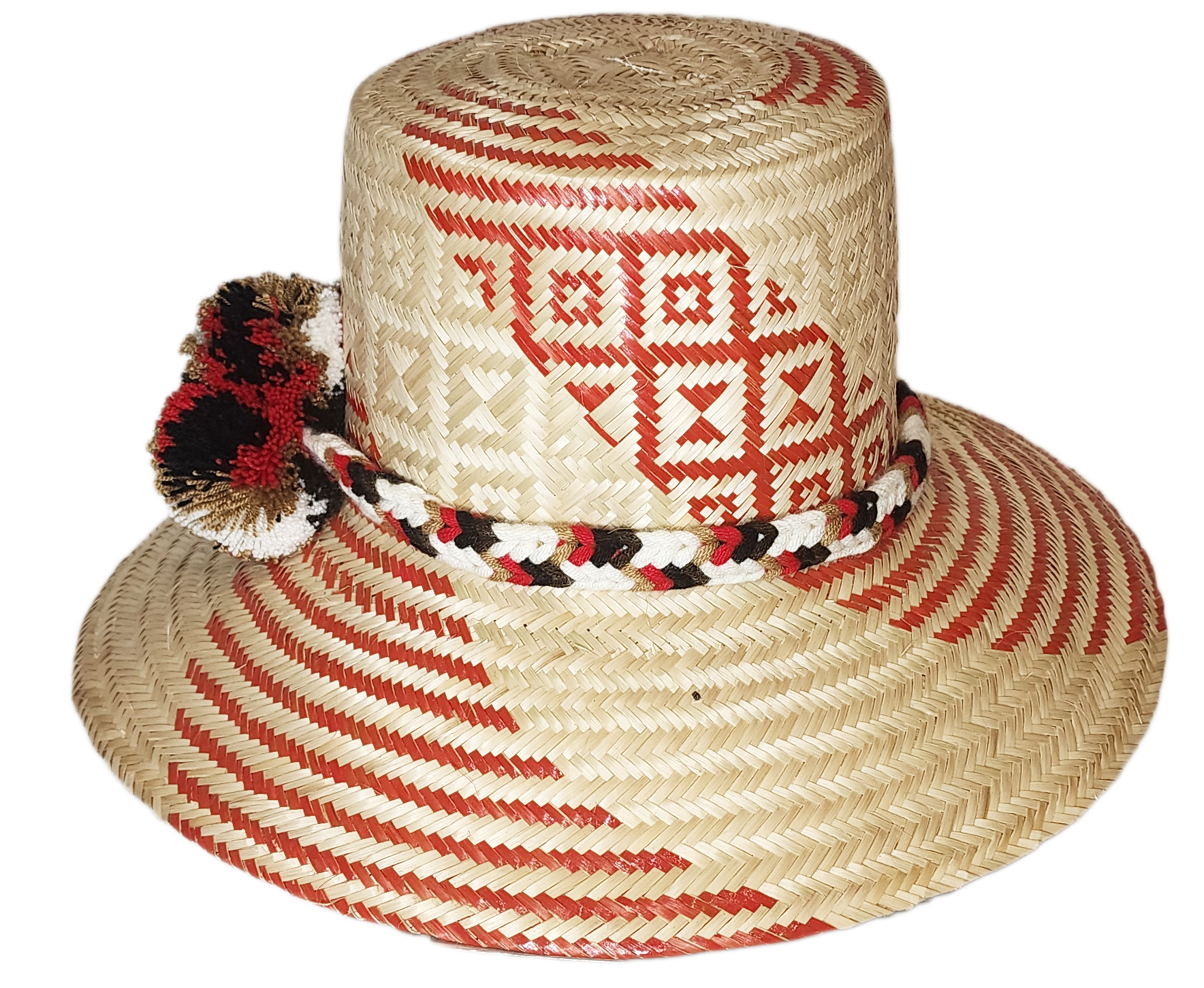 "Colorful handmade Wayuu hat crafted from Iraca palm, featuring decorative pompoms and adaptable fit, promoting Wayuu culture