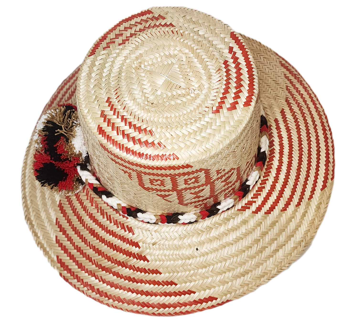 "Colorful handmade Wayuu hat crafted from Iraca palm, featuring decorative pompoms and adaptable fit, promoting Wayuu culture