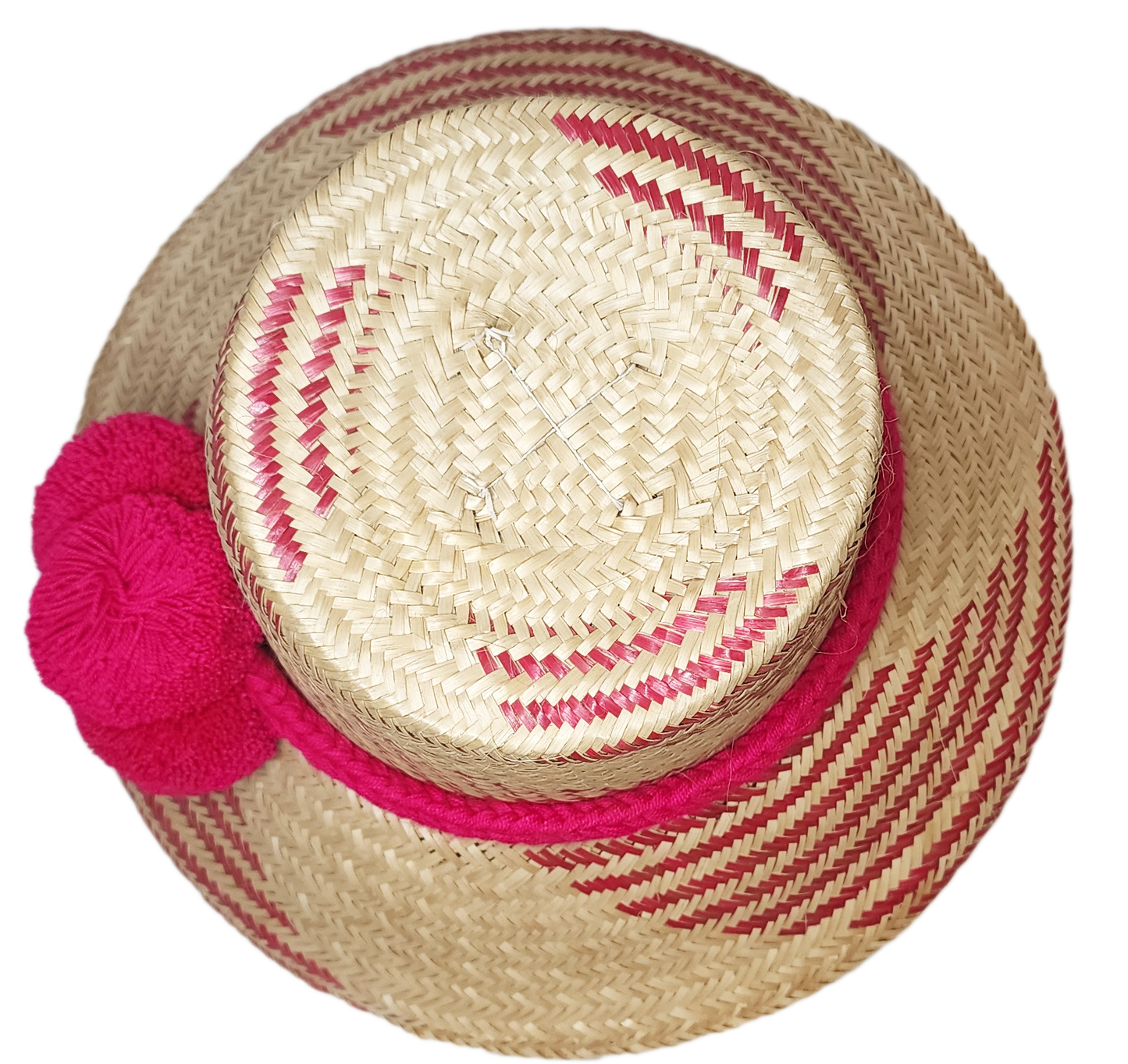"Colorful handmade Wayuu hat crafted from Iraca palm fiber, adorned with significant pompoms, from Colombia and Venezuela."
