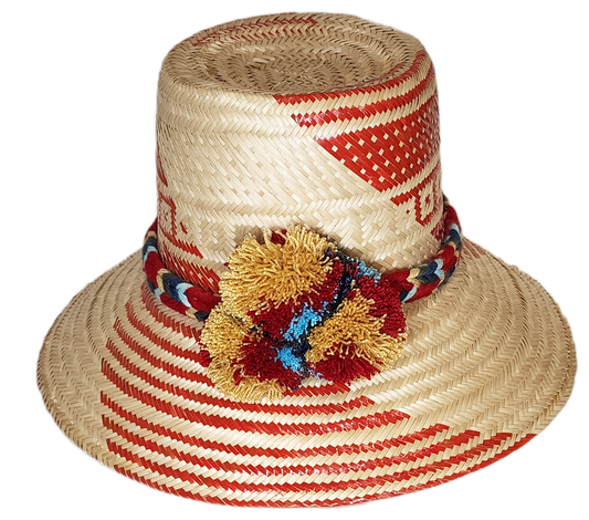"Colorful Handmade Wayuu Hat crafted from Iraca palm fiber with decorative pompoms, symbolizing financial prosperity."