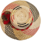 "Colorful handmade Wayuu hat crafted from Iraca palm fibers, adorned with significant cultural pom-poms for style and sun pro