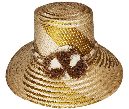 "Colorful handmade Wayuu hat crafted from Iraca palm fibers, featuring decorative pompoms and adjustable fit for various styl