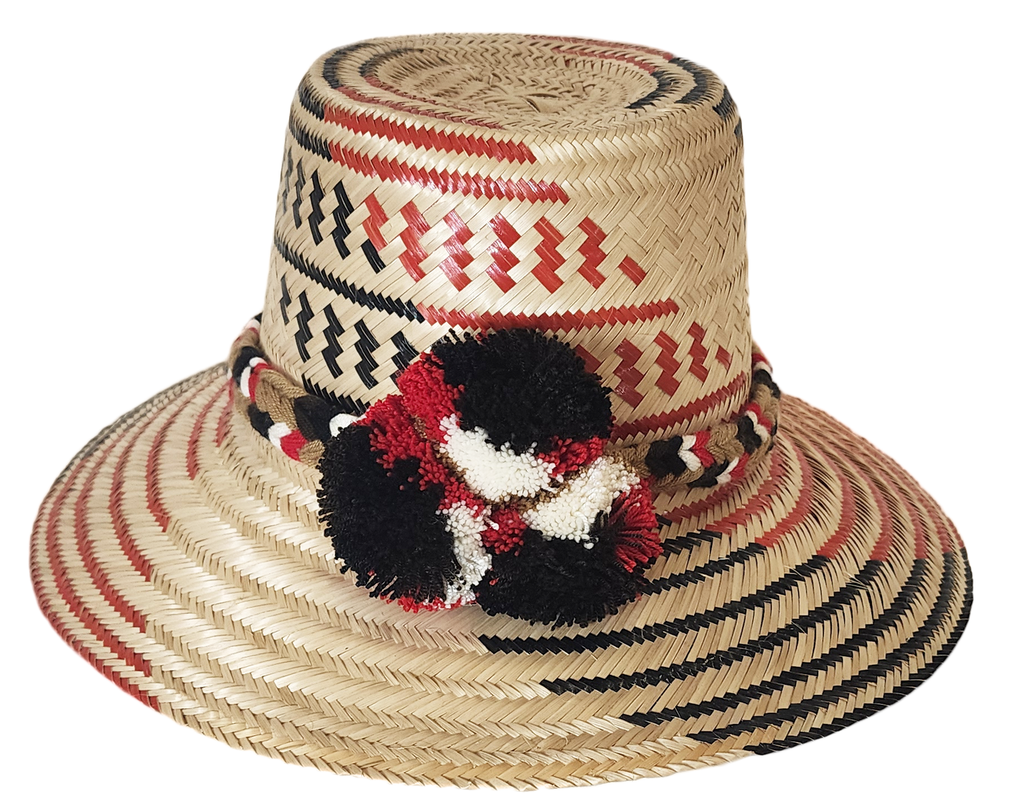 "Colorful handmade Wayuu hat crafted from Iraca palm fibers with distinctive pompoms, offering versatile style and cultural s