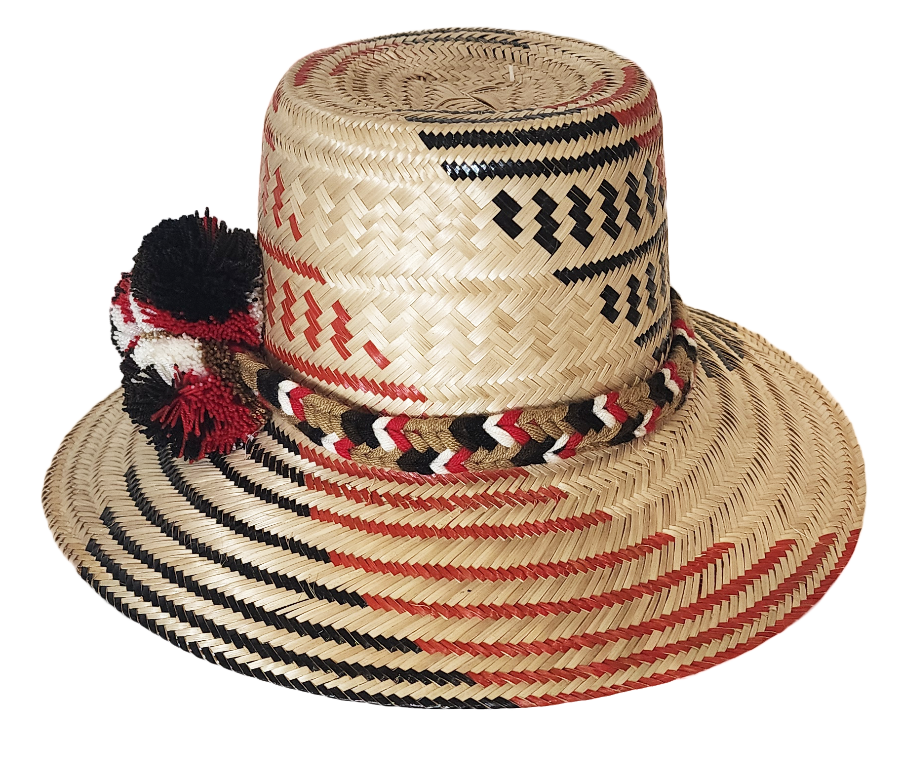 "Colorful handmade Wayuu hat crafted from Iraca palm fibers with distinctive pompoms, offering versatile style and cultural s