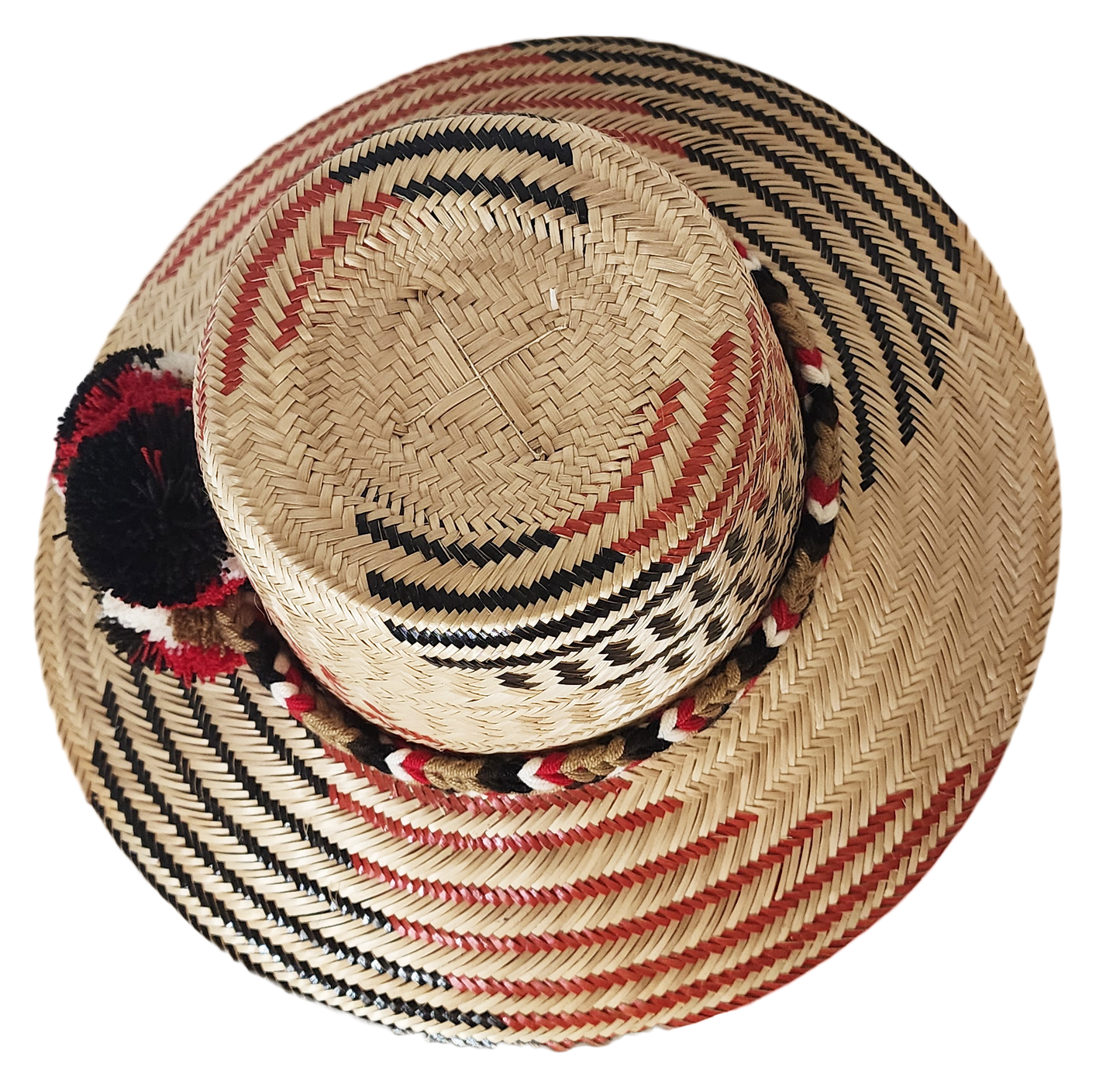 "Colorful handmade Wayuu hat crafted from Iraca palm fibers with distinctive pompoms, offering versatile style and cultural s