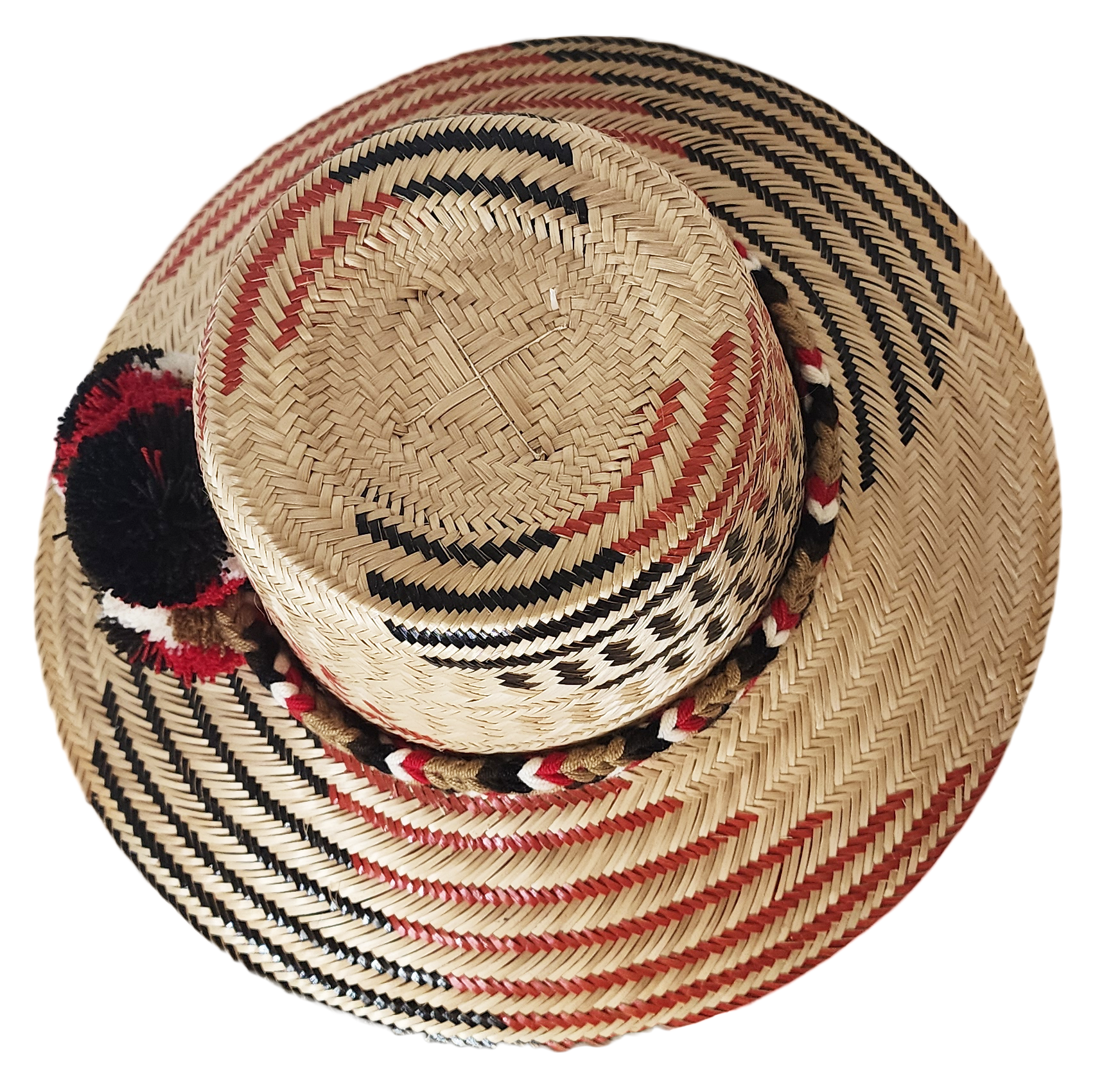 "Colorful handmade Wayuu hat crafted from Iraca palm fibers with distinctive pompoms, offering versatile style and cultural s