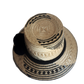 "Colorful handmade Wayuu hat crafted from Iraca palm fibers with culturally significant pompoms, offering sun protection and 
