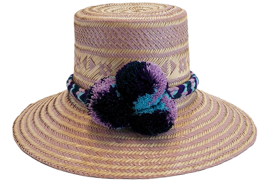 "Colorful handmade Wayuu hat from Iraca palm, adorned with cultural pompoms, adjustable for any head size, supports Wayuu chi