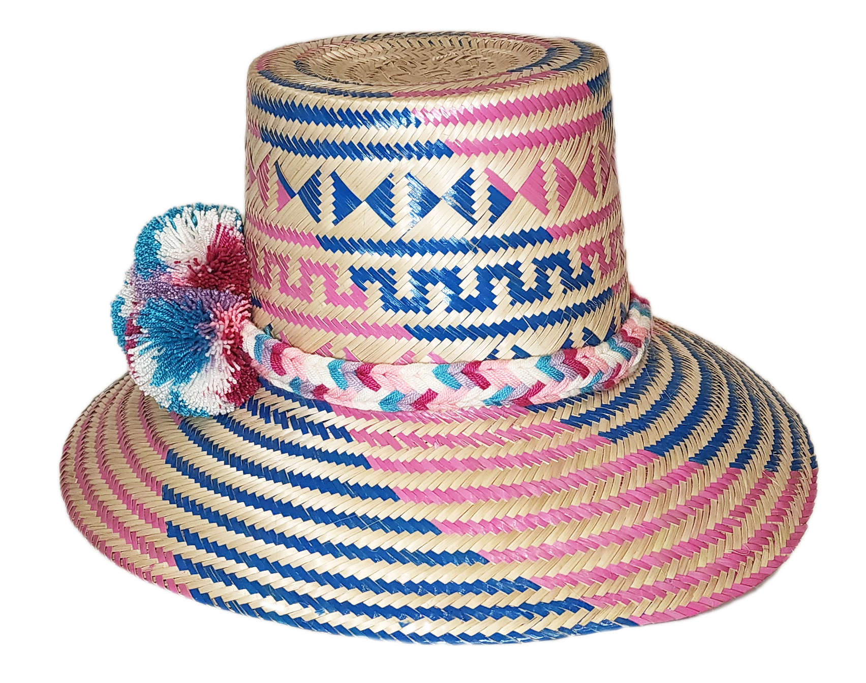 "Colorful handmade Wayuu hat from Iraca palm, adorned with significant pompoms, offering style and sun protection."