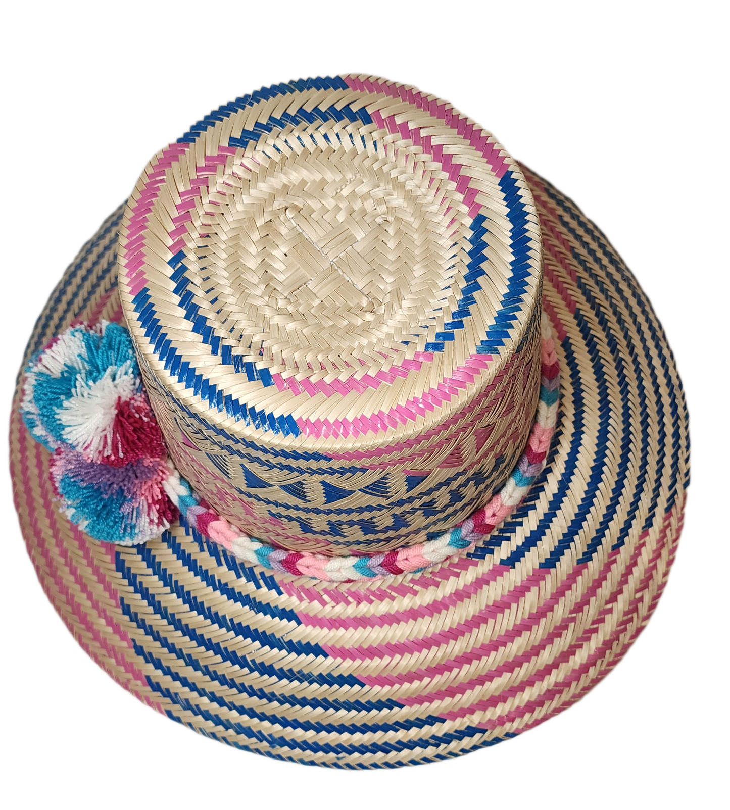 "Colorful handmade Wayuu hat from Iraca palm, adorned with significant pompoms, offering style and sun protection."