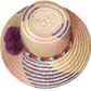 "Colorful handmade Wayuu hat from Iraca palm fibers, adorned with symbolic pompoms, offering sun protection and adjustable fi