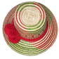 "Colorful handmade Wayuu hat woven from Iraca palm fibers, adorned with significant pompoms, adjustable for style and fit."