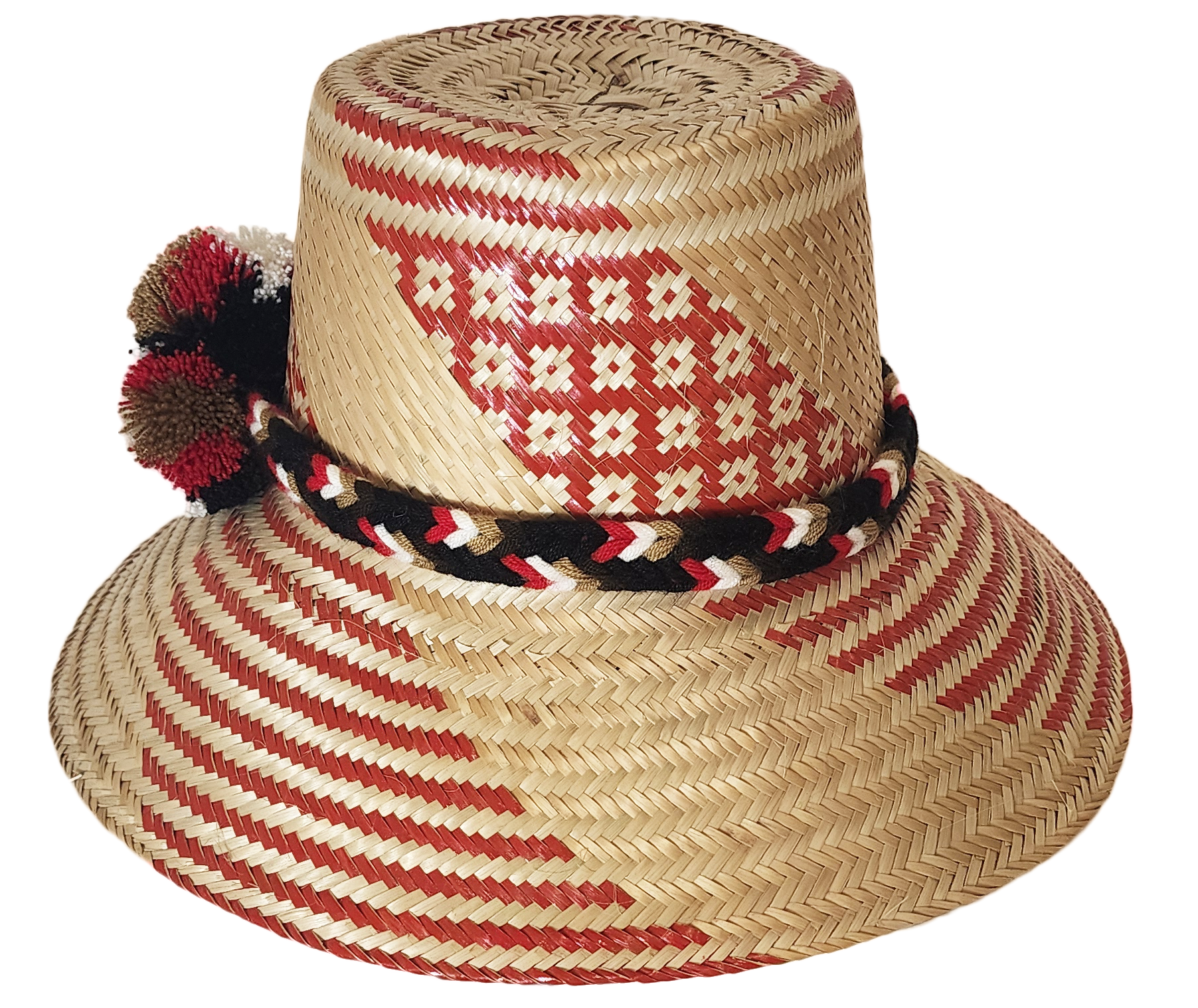 "Colorful handmade Wayuu hat from Iraca palm fibers, featuring adjustable fit and cultural pompoms, supporting Wayuu Taya Fou