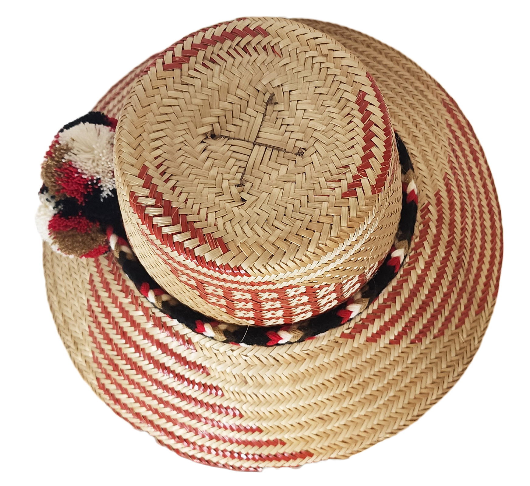"Colorful handmade Wayuu hat from Iraca palm fibers, featuring adjustable fit and cultural pompoms, supporting Wayuu Taya Fou