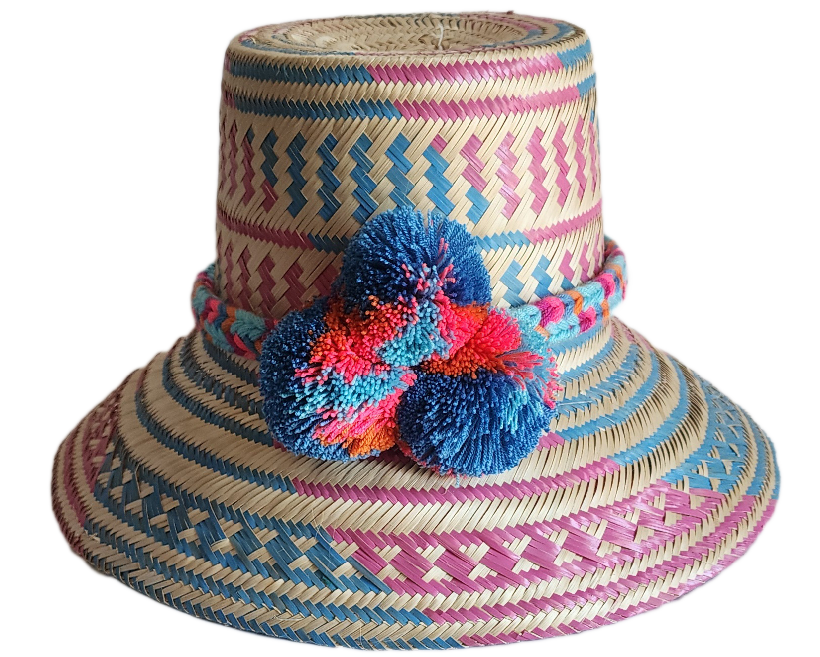 "Colorful handmade Wayuu hat, handwoven from Iraca palm fibers, adorned with culturally significant pompoms, adjustable fit."