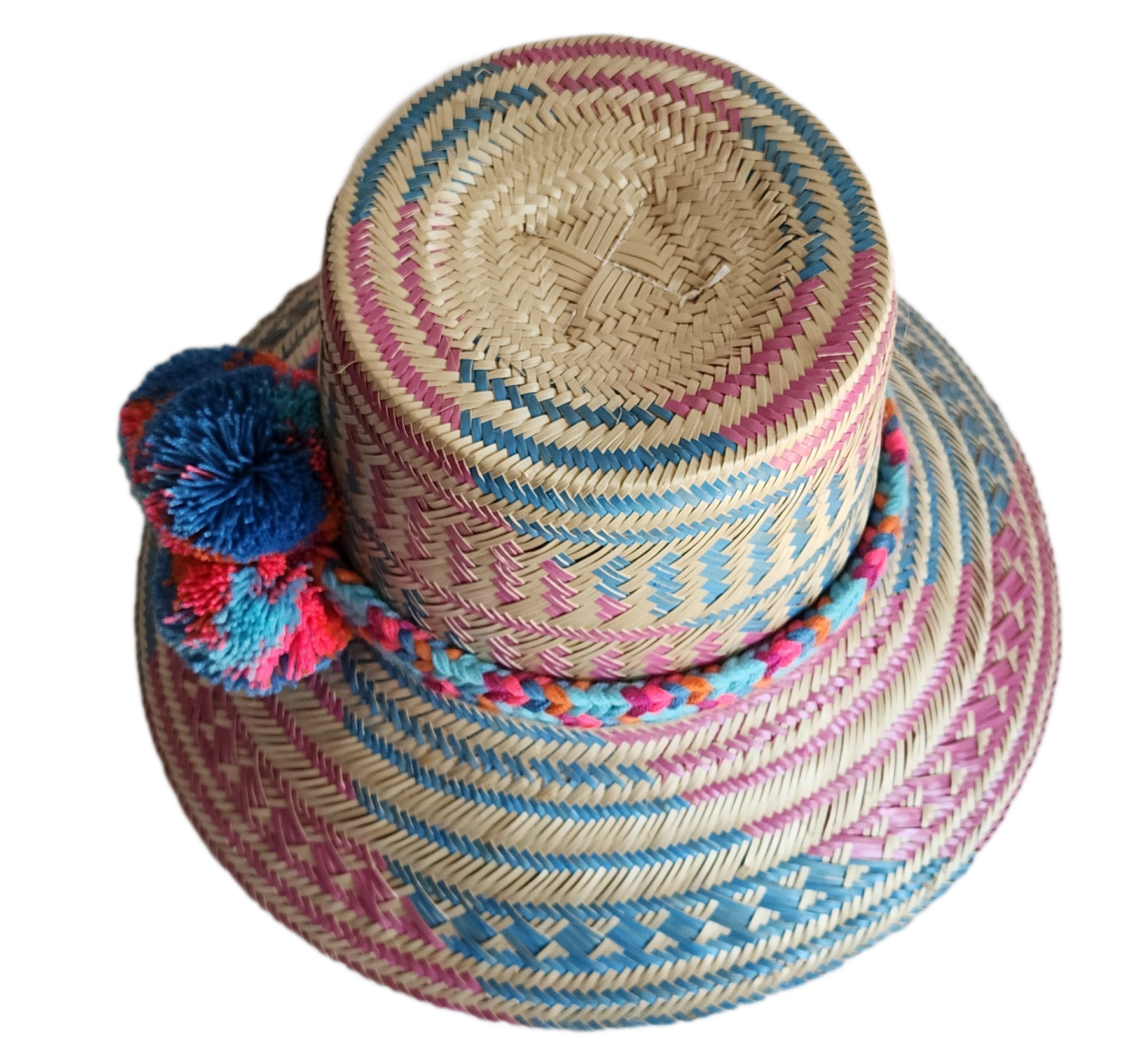 "Colorful handmade Wayuu hat, handwoven from Iraca palm fibers, adorned with culturally significant pompoms, adjustable fit."