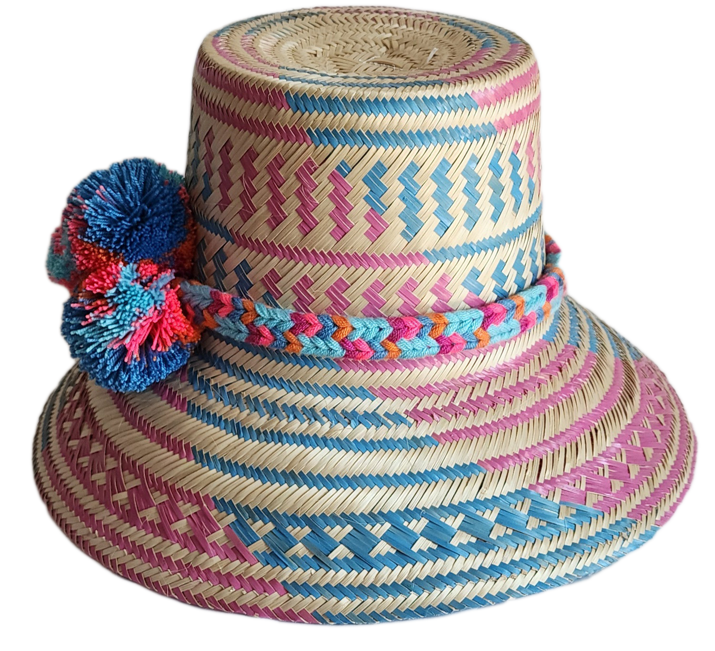 "Colorful handmade Wayuu hat, handwoven from Iraca palm fibers, adorned with culturally significant pompoms, adjustable fit."