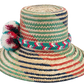 "Colorful handmade Wayuu hat with decorative pompoms, crafted from Iraca palm fibers, offering style and sun protection."