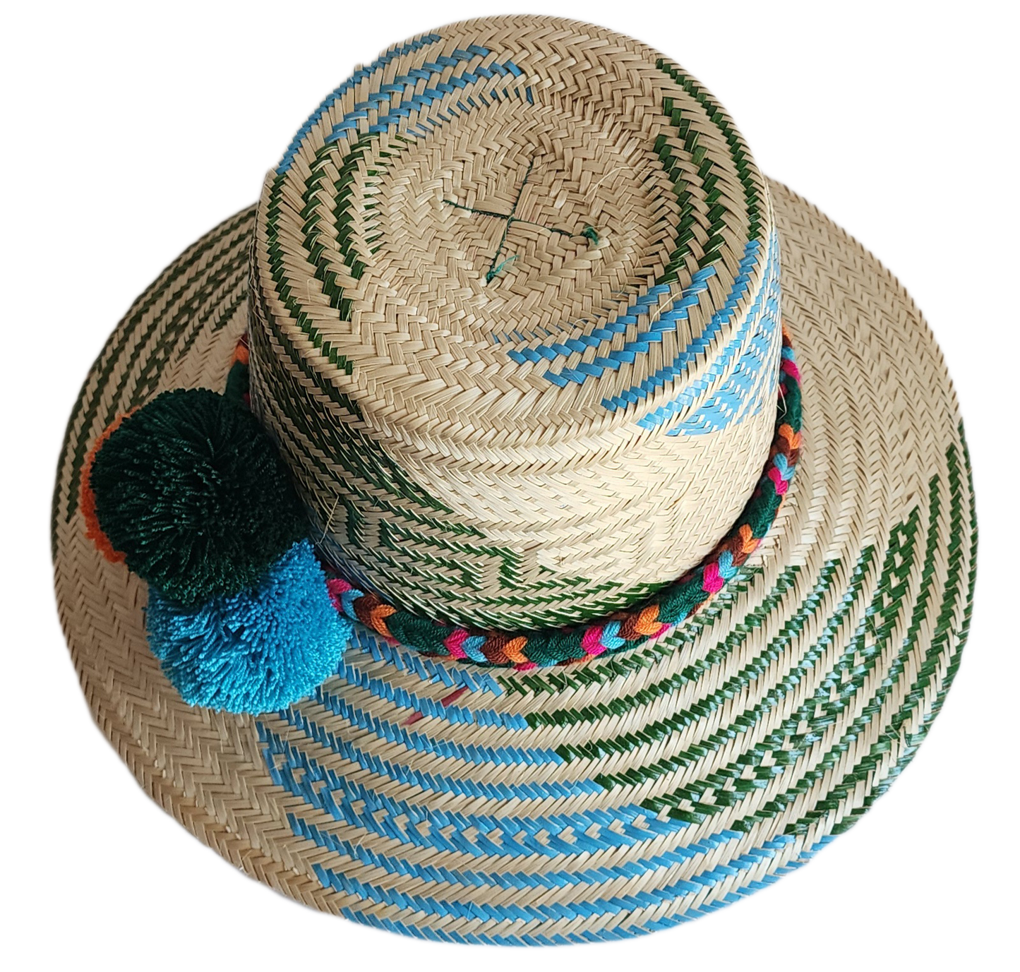 "Colorful handmade Wayuu hat woven from Iraca palm fibers, featuring decorative pompoms and offering adjustable fit."