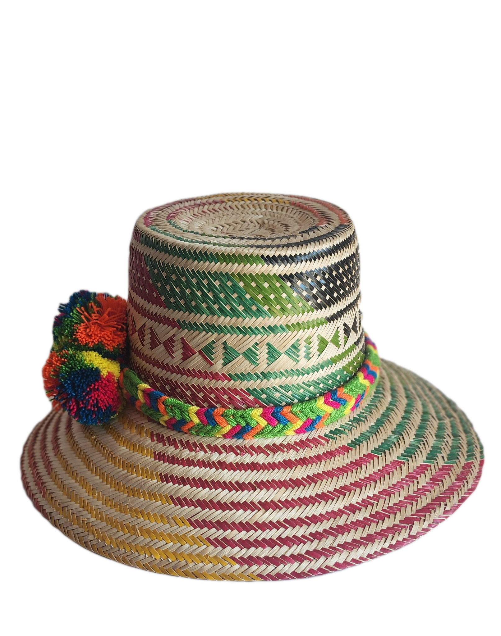 "Colorful handmade Wayuu hat woven from Iraca palm with adjustable fit and cultural pompoms, supporting Wayuu artisans."