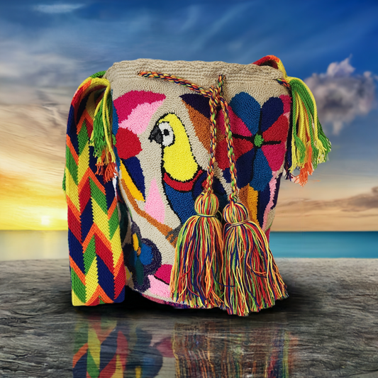 "Colorful handmade Wayuu punch needle crochet bag with adjustable straps, showcasing vibrant geometric patterns and craftsman