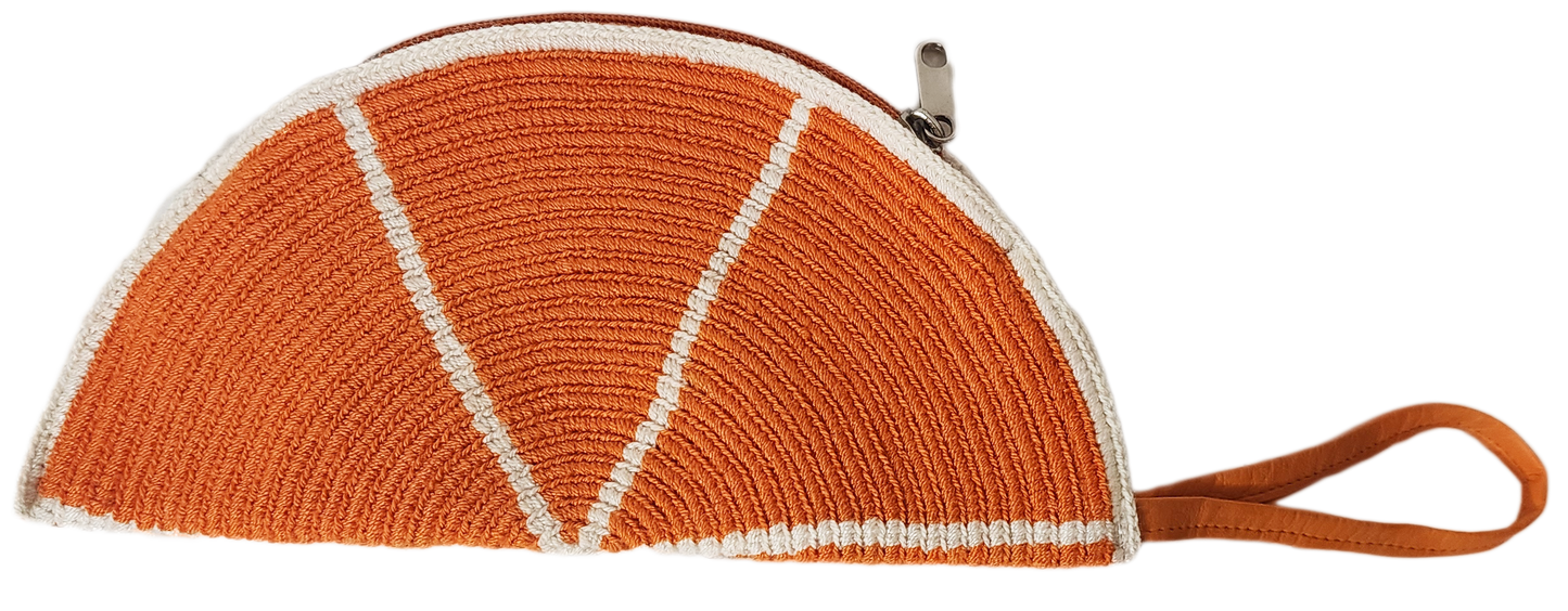 "Colorful handmade Wuitusu Artisan Crochet Halfmoon Clutch, crafted by Wayuu artisans, featuring vibrant traditional patterns
