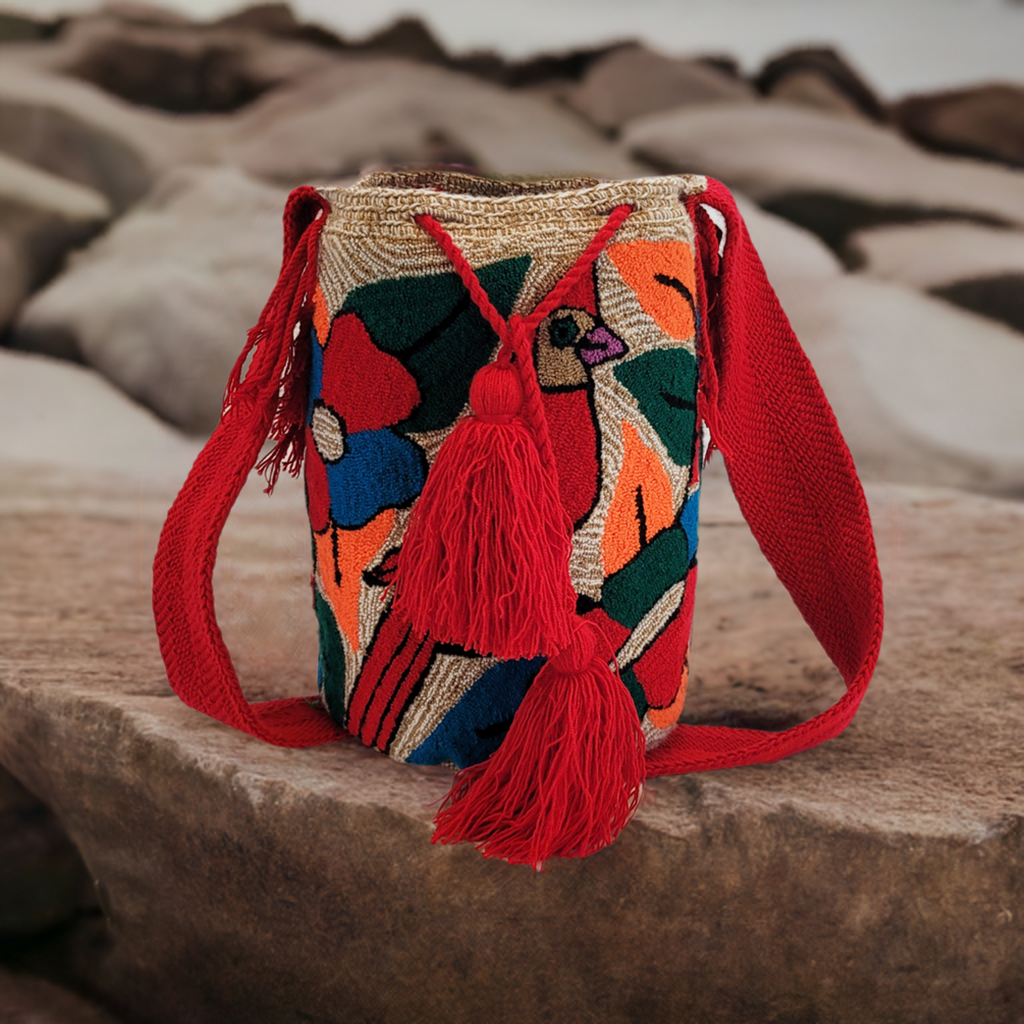 "Colorful handmade Wuitusu crochet bag, featuring vibrant, geometric patterns inspired by Wayuu heritage."