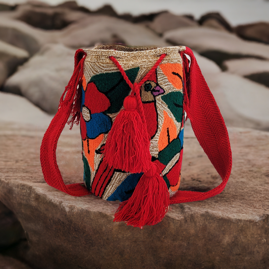 "Colorful handmade Wuitusu crochet bag, featuring vibrant, geometric patterns inspired by Wayuu heritage."