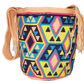 "Colorful handmade Wuitusu crochet Wayuu bag, showcasing traditional geometric patterns and a long woven strap for versatile 