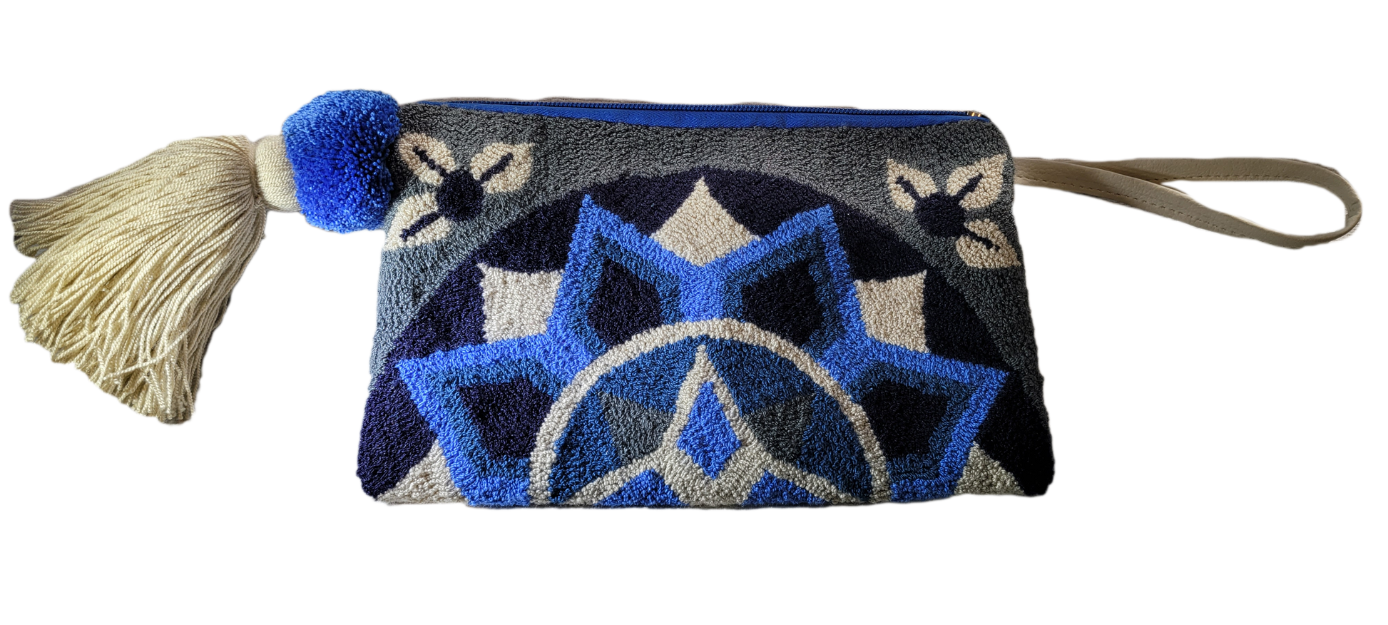 1 "Colorful handmade Wuitusu Needle Punch Clutch by Wayuu artisans, featuring a vibrant pattern, zippered closure, and durable 