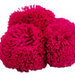 "Colorful handmade Wuitusu straw hat adorned with customizable pompoms, showcasing artisan craftsmanship and fair trade commi