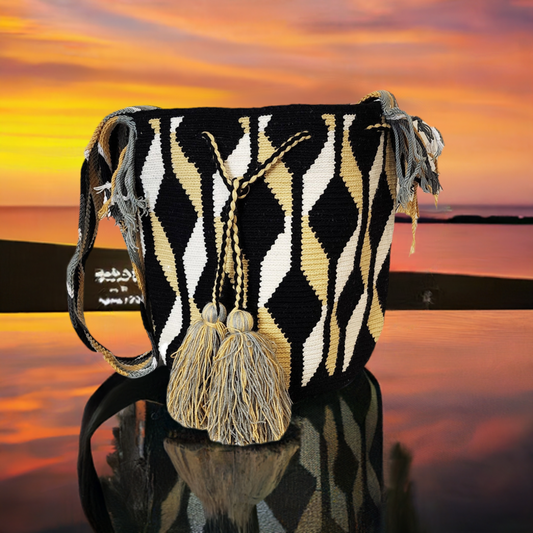 "Colorful handmade Wuitusu Wayuu crochet bag, showcasing vibrant geometric patterns and boho style, crafted by indigenous art