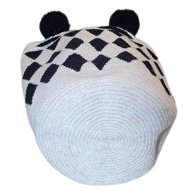 "Colorful handmade Wuitusu Wayuu crochet bag with short handle, celebrating traditional artistry and supporting fair trade."