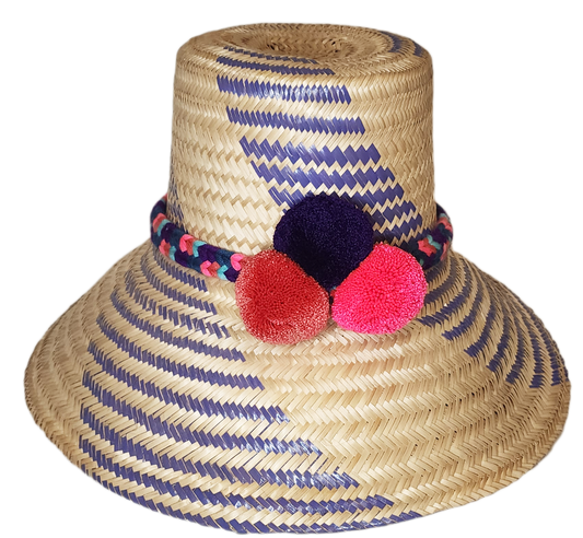 "Colorful handmade Wuitusu Wayuu hat crafted from Iraca palm fiber, adorned with culturally significant pompoms, adjustable f