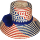 "Colorful handmade Wuitusu Wayuu hat crafted from Iraca palm fibers, adorned with symbolic pompoms, offering versatile stylin