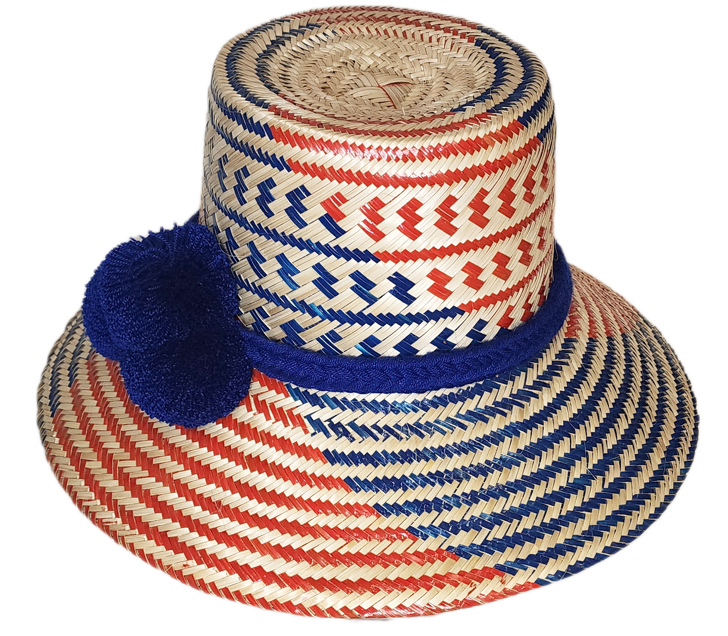 "Colorful handmade Wuitusu Wayuu hat crafted from Iraca palm fibers, adorned with symbolic pompoms, offering versatile stylin