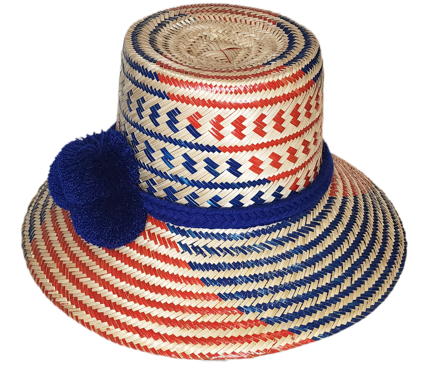 "Colorful handmade Wuitusu Wayuu hat crafted from Iraca palm fibers, adorned with symbolic pompoms, offering versatile stylin