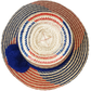 "Colorful handmade Wuitusu Wayuu hat crafted from Iraca palm fibers, adorned with symbolic pompoms, offering versatile stylin