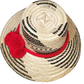 "Colorful handmade Wuitusu Wayuu Hat crafted from Iraca palm fibers, adorned with cultural pompoms for style and prosperity."