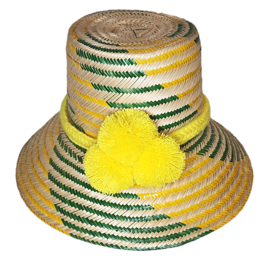 "Colorful handmade Wuitusu Wayuu hats crafted from Iraca palm fibers, featuring distinctive pompoms and versatile styling opt