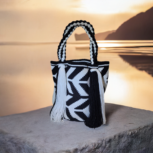 "Colorful handmade Wuitusu Wayuu Waterfall Purse with intricate crochet patterns, fringe details, and vibrant boho style."