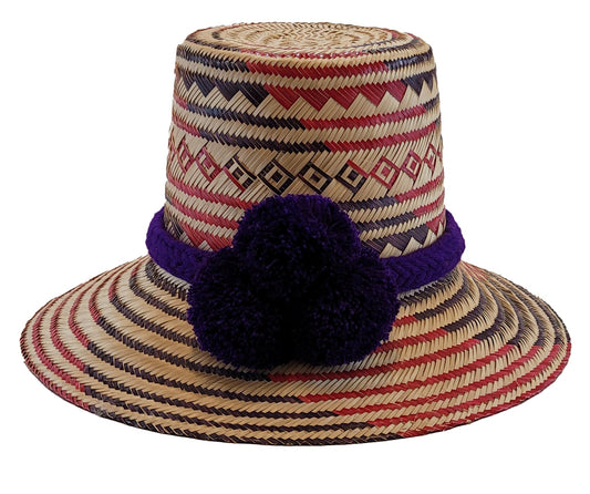 "Colorful handwoven Artisan Wayuu Hat made from iraca palm fibers, featuring a broad brim for sun protection and vibrant patt